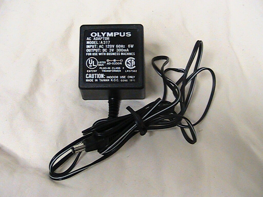 New 3VDC 300MA OLYMPUS AC ADAPTER A317 120VAC wall power charger
